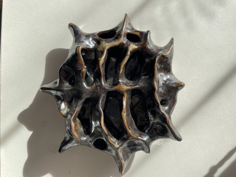 rzeźba do powieszenie na ścianie Czarne Słońce 