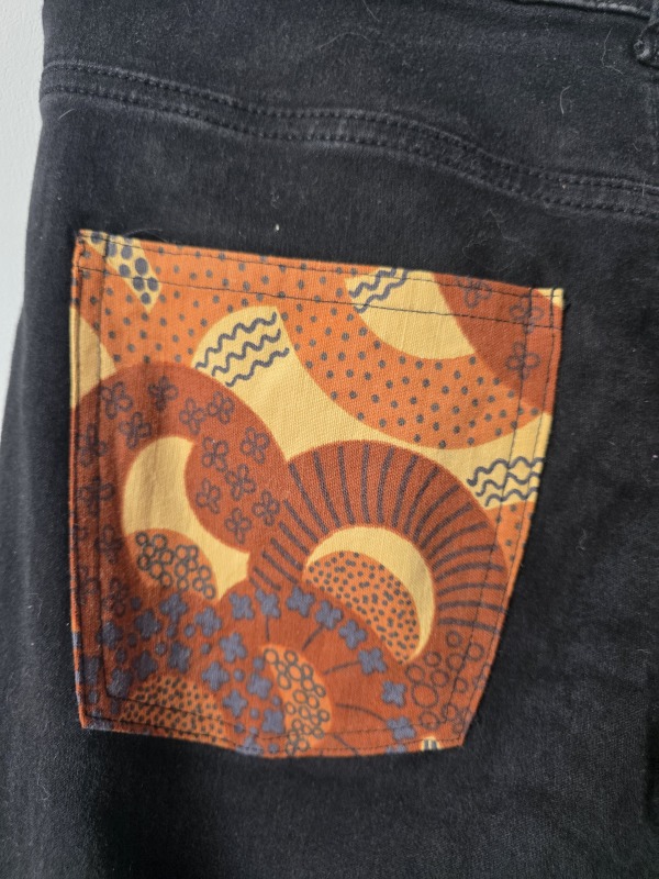 Spodnie dzwony z klinem czarno-pomarańczowe 